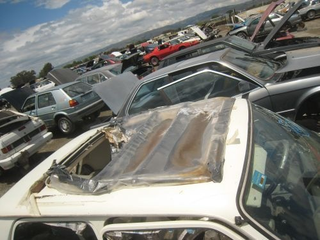 Illustration for article titled Sunroof, Great Mileage Can't Keep This Le Car Out Of The Junkyard